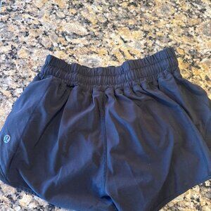 Like new black size 0 low rise 2.5 inseam Lululemon Hotty hot shorts